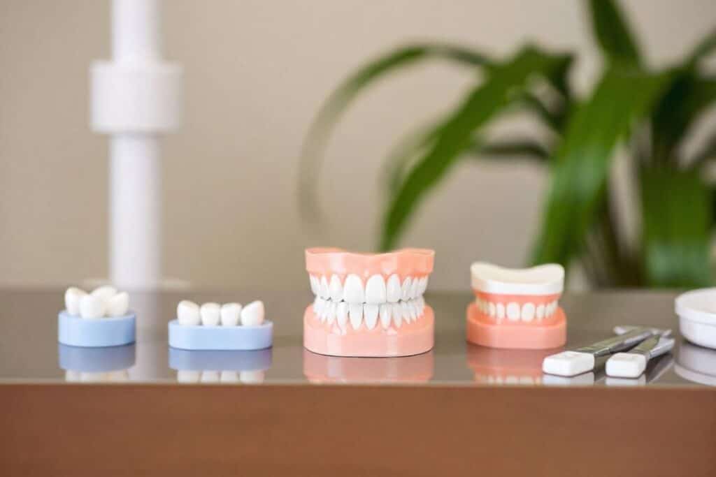 dental veneers on table in dental office at artesia