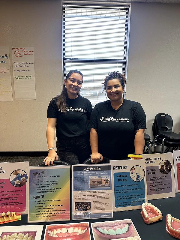 Smile Xpressions Dentistry team members at a career day outreach event