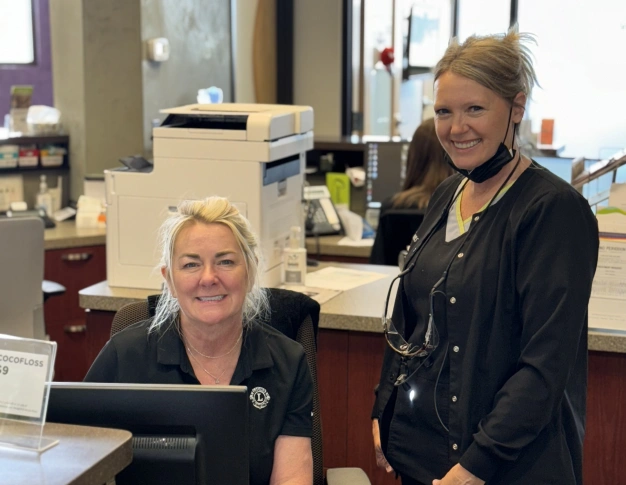 Front desk team assisting with insurance and financing at Smile Xpressions Dentistry